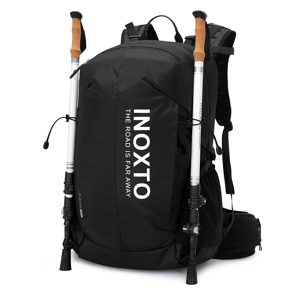 Exterior trekking pole retention and side bottle pockets